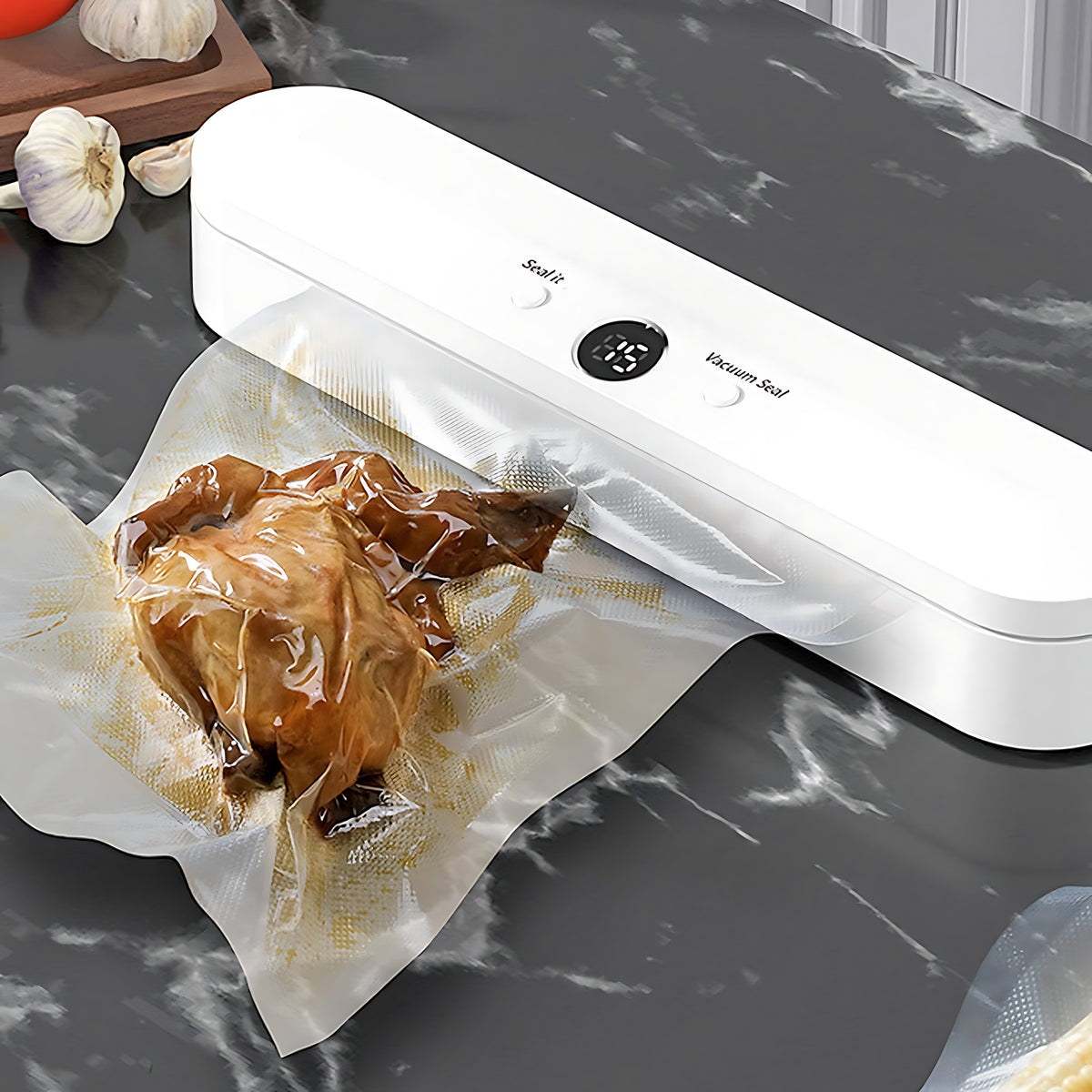 Vault sealing food in a vacuum bag